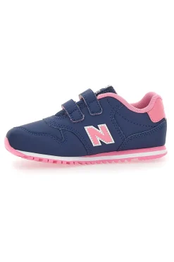 NEW BALANCE Blaue Sneakers 500 mit rosa Details und Klettverschluss